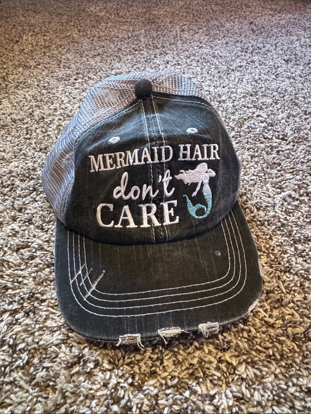 Katydid Black Mesh Trucker Hat with White and Teal Embroidery
